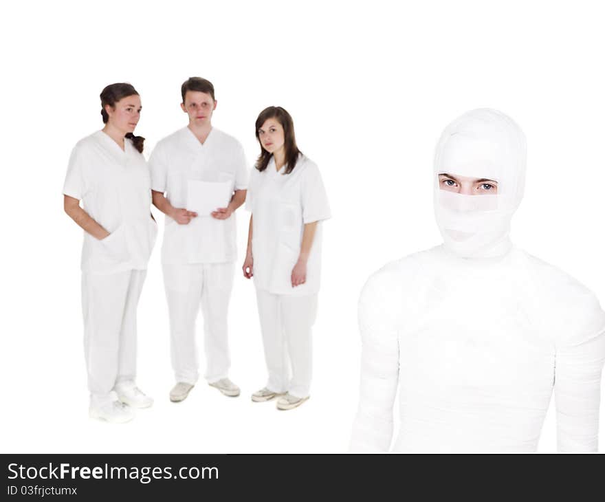 Injured men in front of a Doctors Team. Injured men in front of a Doctors Team