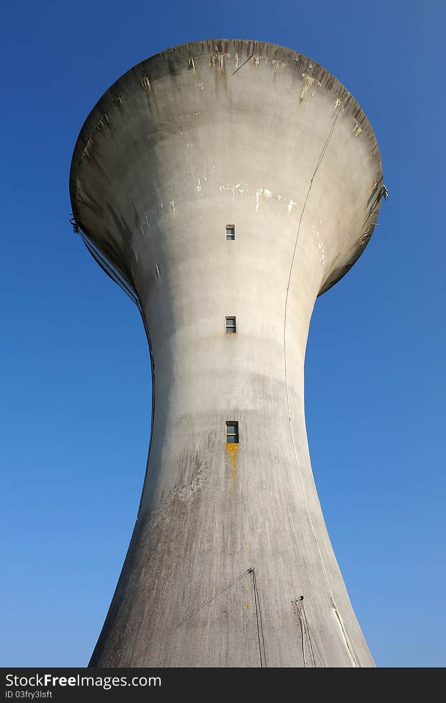An old water tower in concrete. An old water tower in concrete