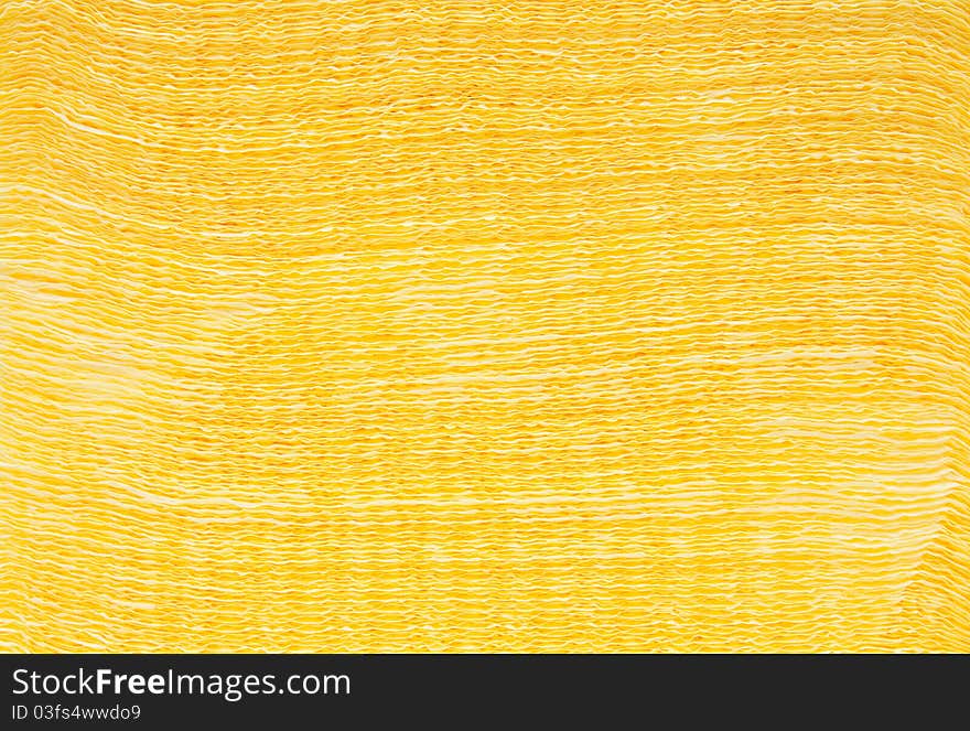 Textured heap of yellow napkins. Textured heap of yellow napkins