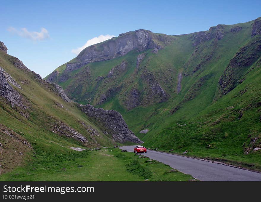 Winnats Pass Derbyshire showing cars on the down hill section