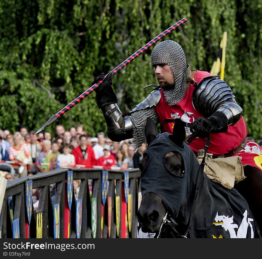 Medieval knight on horseback in a tournament.