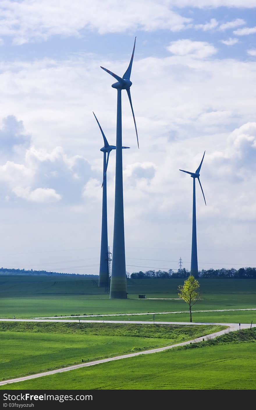 Spring landscape with wind turbine towers. Spring landscape with wind turbine towers.