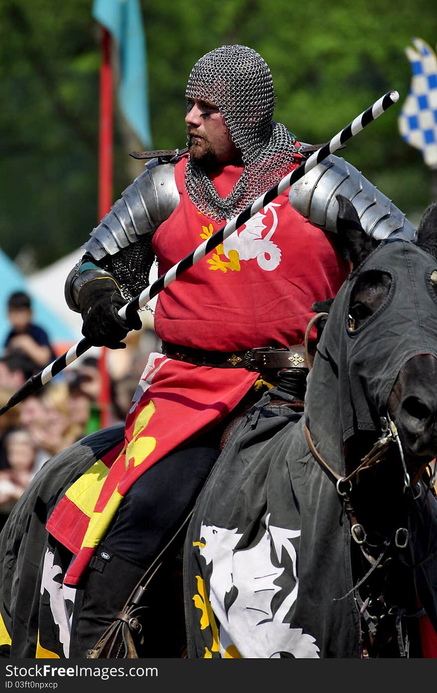 Medieval knight on horseback in a tournament.