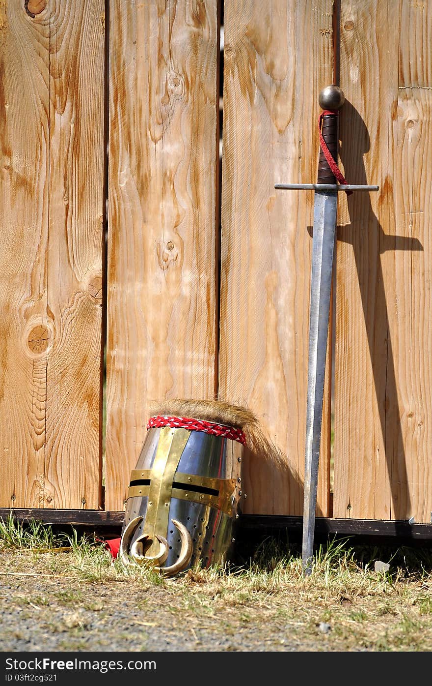 Knight's helmet and sword knight tournament. Knight's helmet and sword knight tournament