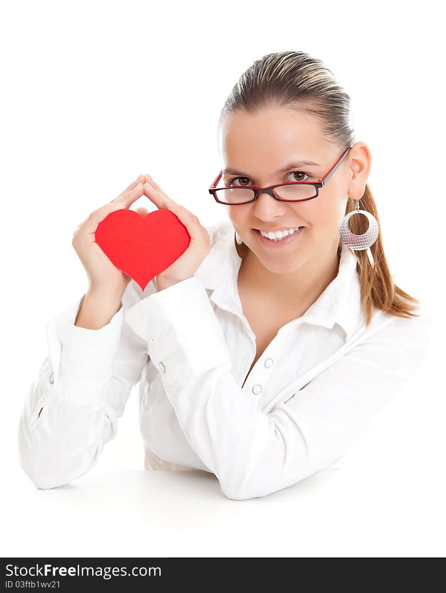 Portrait of a beautiful smiling girl with a red heart