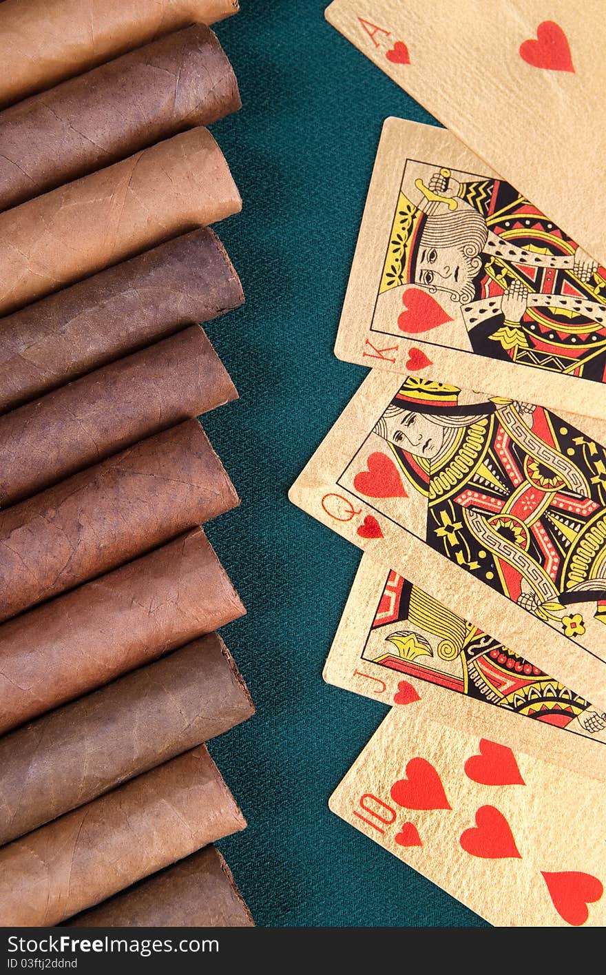 Cigars and playing cards.