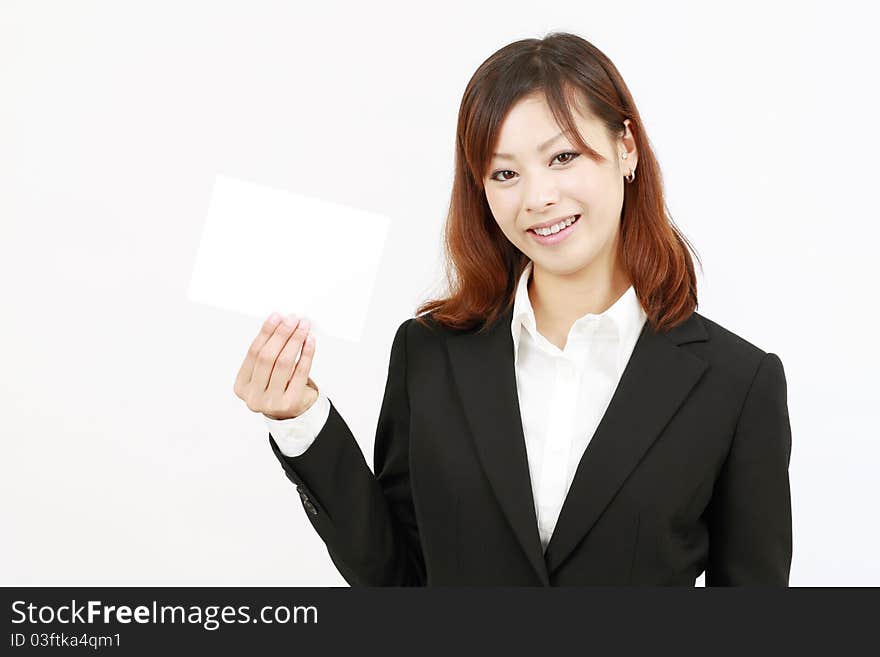 Young businesswoman with card