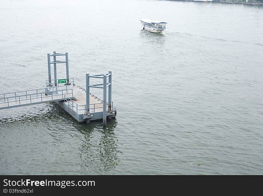 Port waterfront. Moving boat into the harbor park.