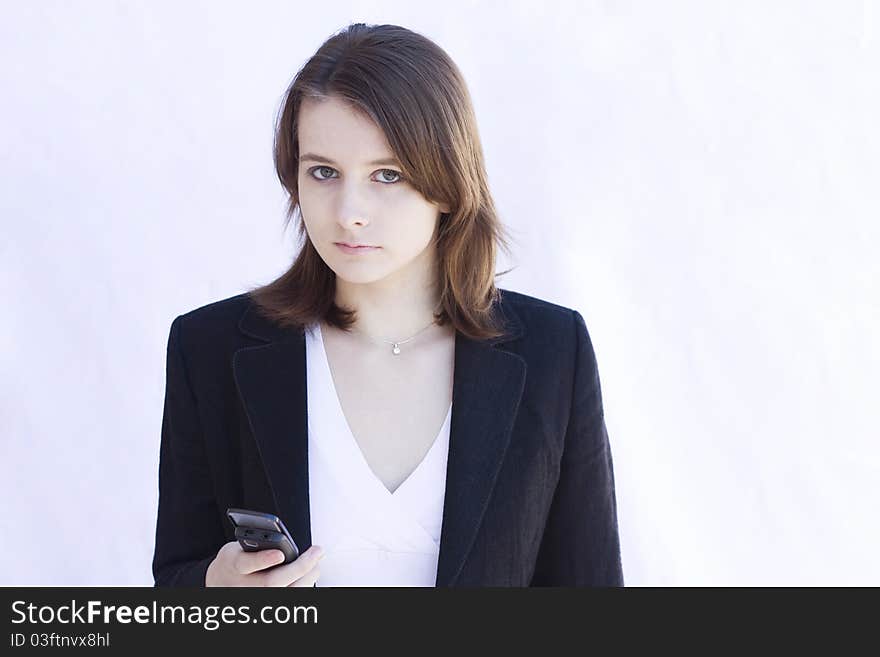 Young woman holding a mobile phone