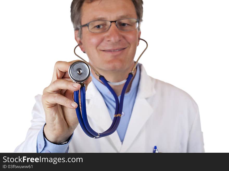 Closeup of a smiling doctor holding a stethoscope.Isolated on white background.