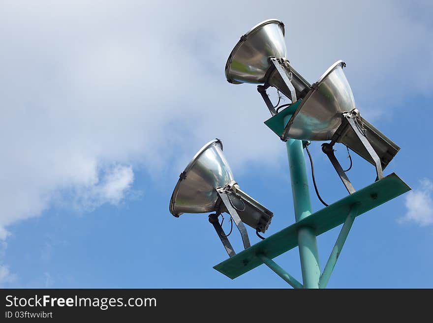 Spot Light shines through the sky. Spotlight shines up to the Grand to see the sky clouds and blue sky, sea