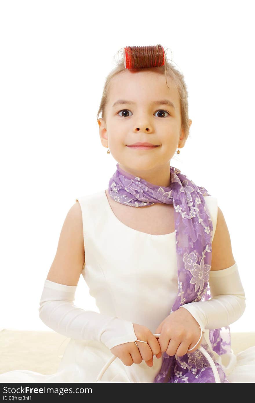 Little girl wearing ball cream dress and red roller in her hair wanting go to dance. Little girl wearing ball cream dress and red roller in her hair wanting go to dance.