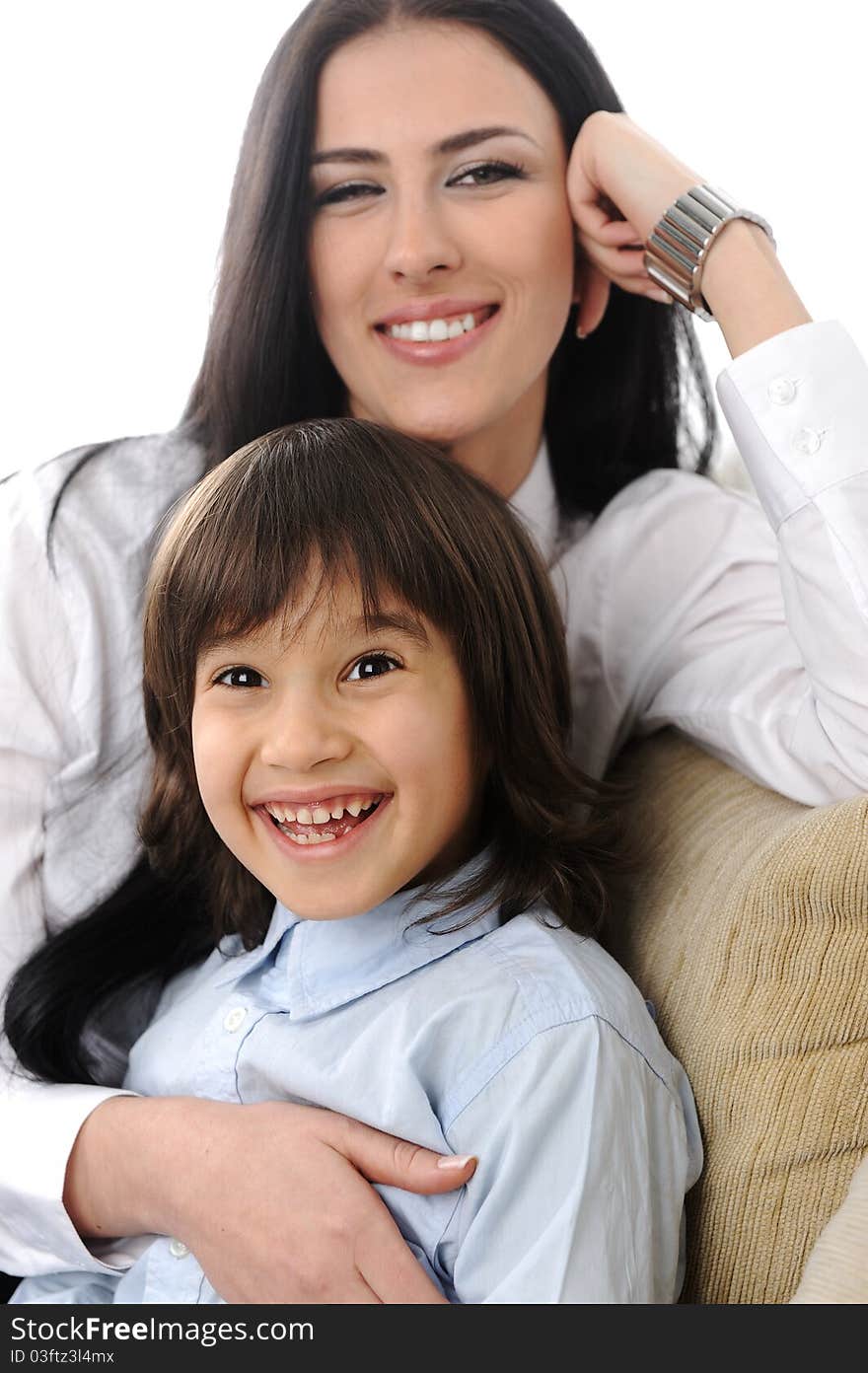 Mother and  son in love together, sitting on sofa at home