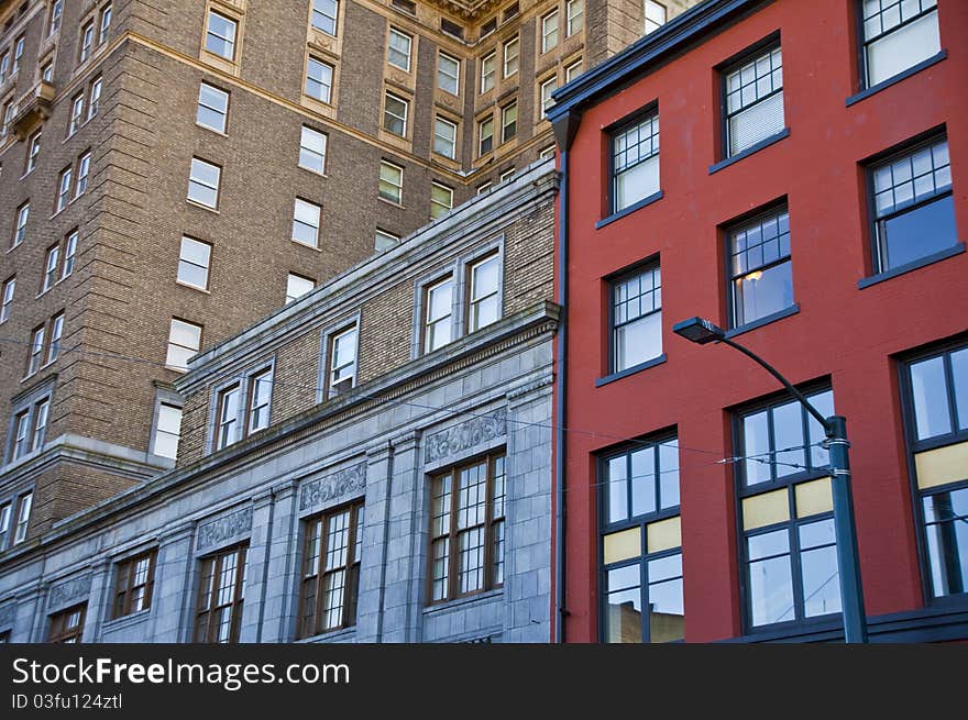 Colorful and contrasting brick office buildings in a downtown location. Colorful and contrasting brick office buildings in a downtown location.