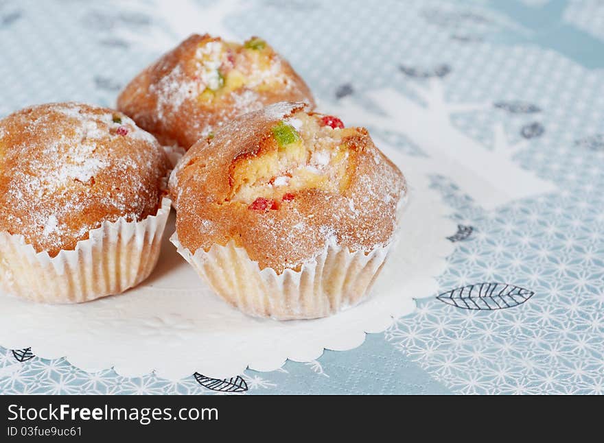 Delicious cupcake on blue background