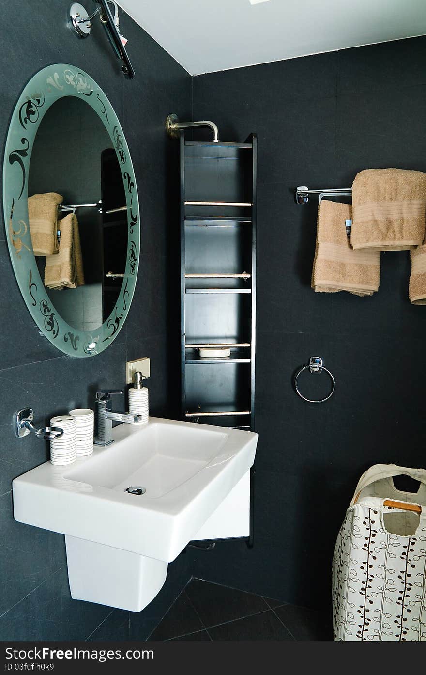 Modern bathroom with tiled walls