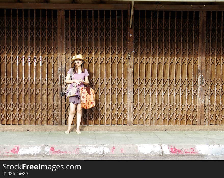 Young woman wearing hat on the street. Young woman wearing hat on the street