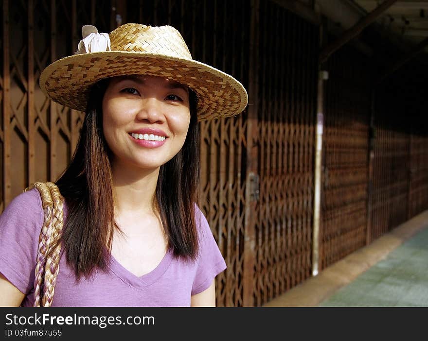 Young woman wearing hat on the street. Young woman wearing hat on the street