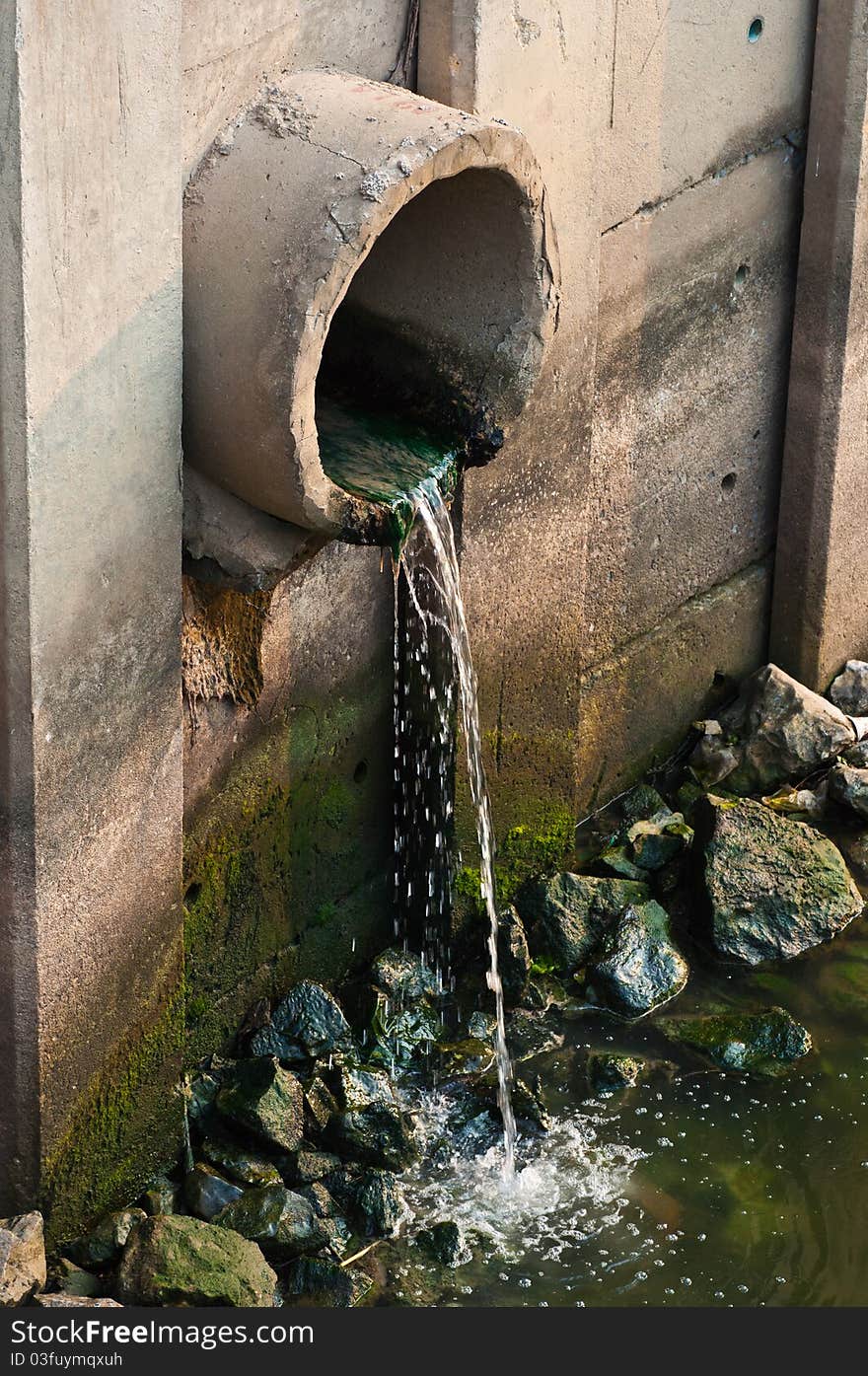 Waster water drainage pipe near by a canal