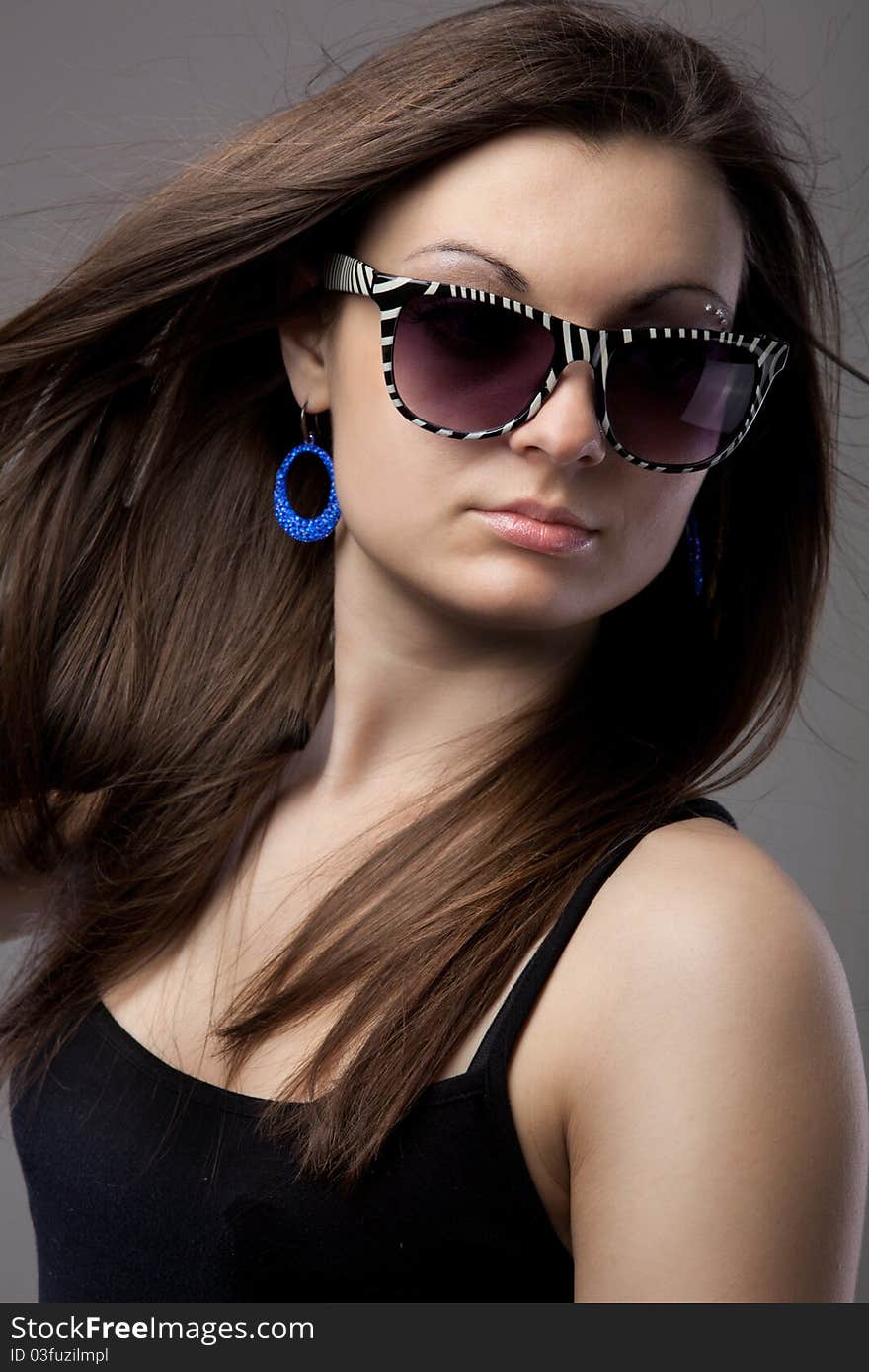 Attractive Young Woman In Glasses