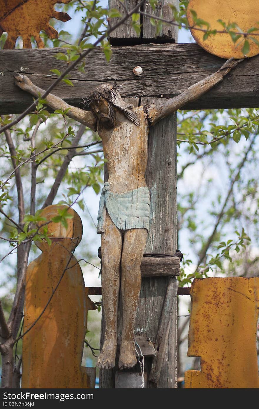 Detail of a very old christian cross, in cemetery. Detail of a very old christian cross, in cemetery.