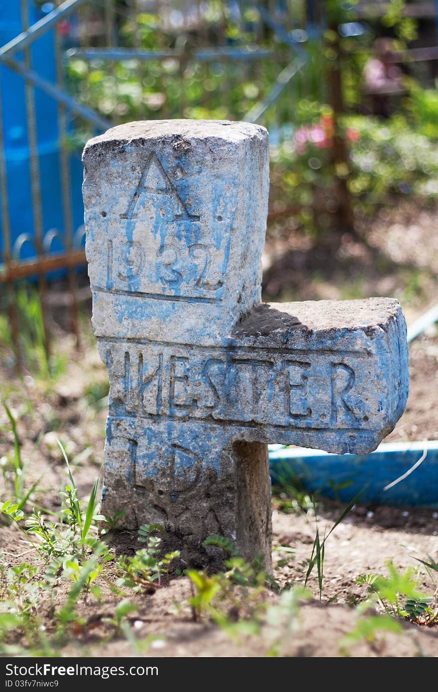 Detail of a very old christian cross, in cemetery. Detail of a very old christian cross, in cemetery.