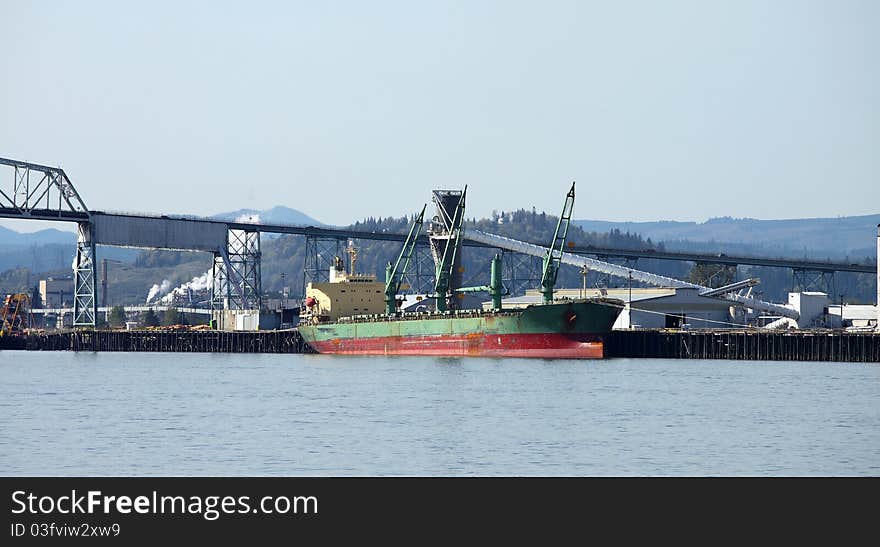 Long Cargo Ship In Longview Washington State.