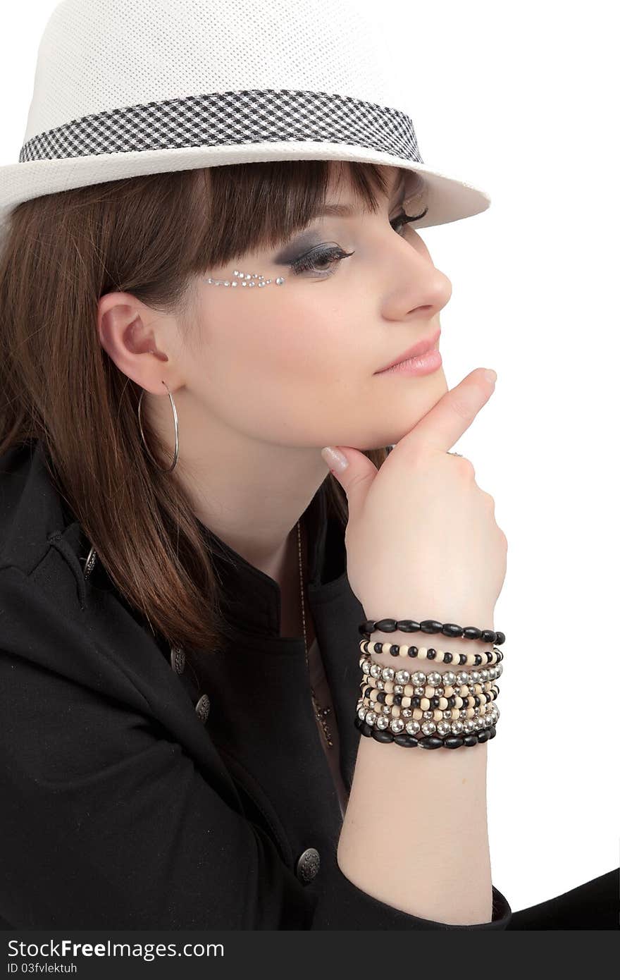 Pretty girl in the hat. Studio shot.