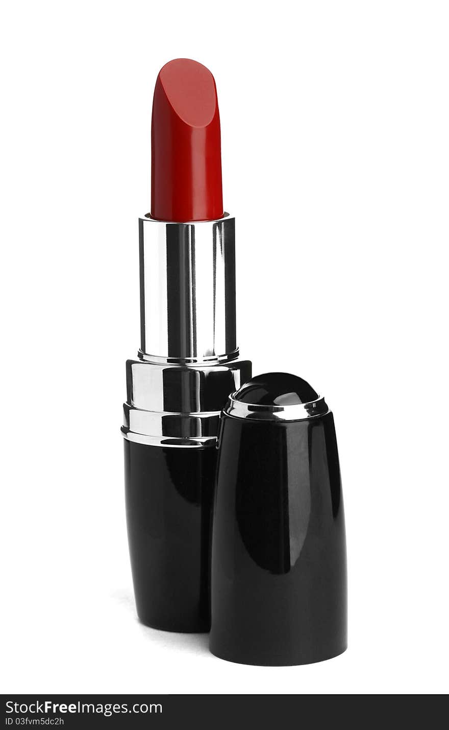 Red lipstick isolated on white. Cosmetic product