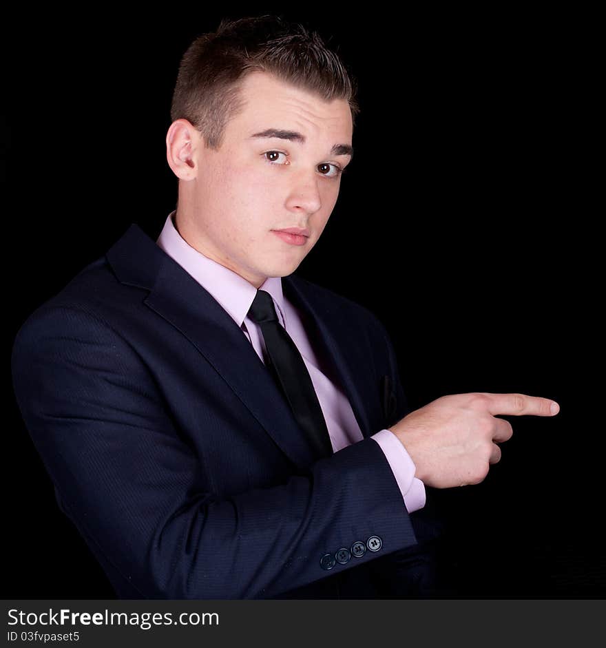 A photograph of a young executive pointing. A photograph of a young executive pointing.