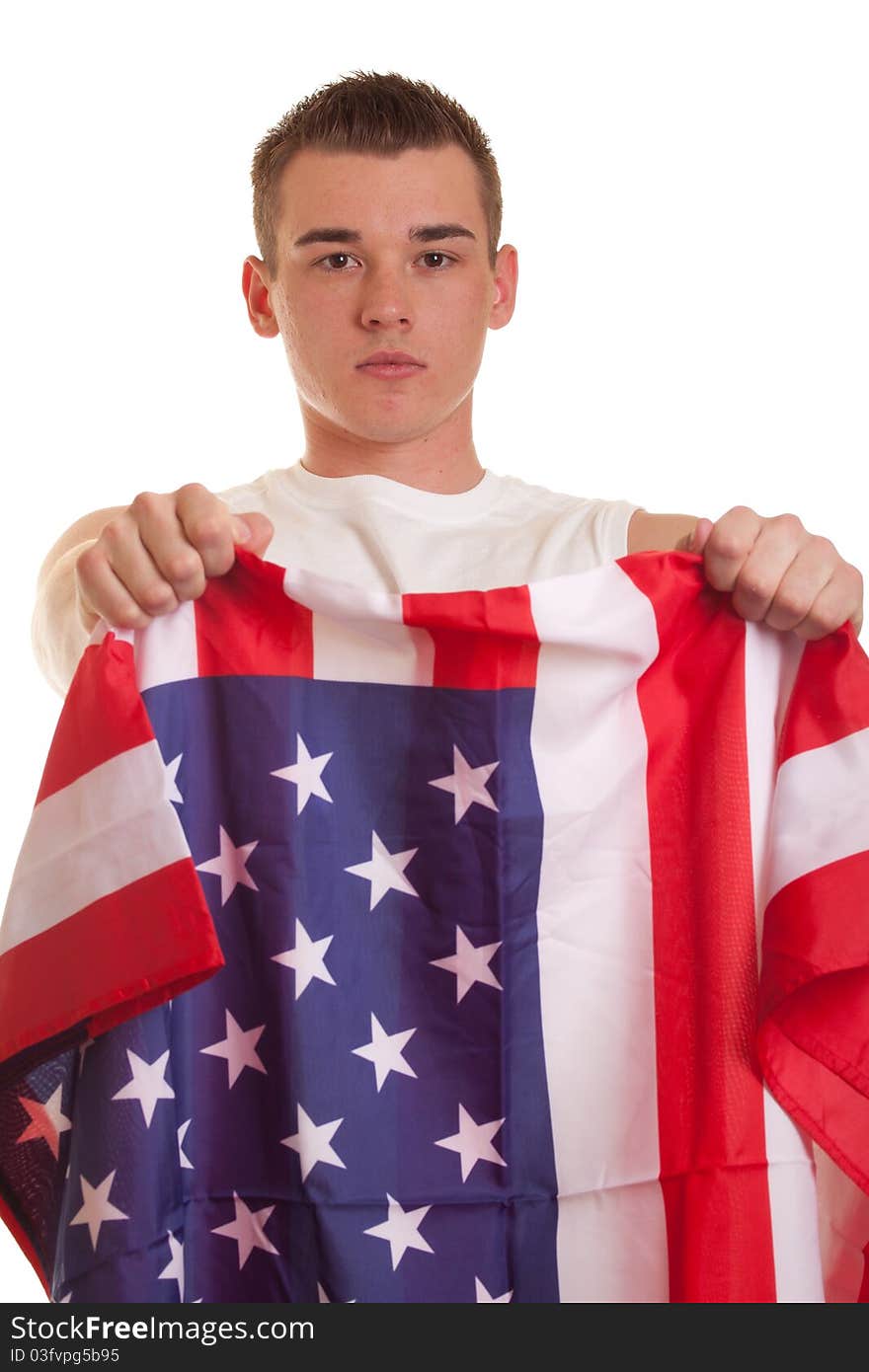 An isolation of an athletic young man holding an american flag. An isolation of an athletic young man holding an american flag.