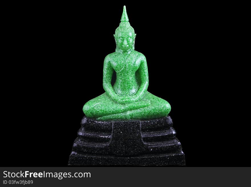 Image of green Buddha on black ground. Image of green Buddha on black ground