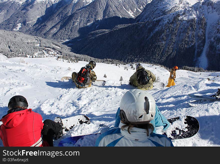 Five snowboarders at start to freeride heaven. Five snowboarders at start to freeride heaven