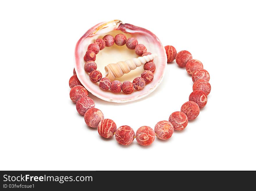 Beads and bracelet with shells.