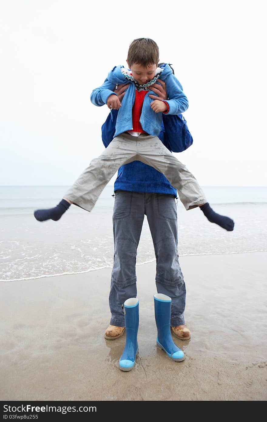 Father and son on beach