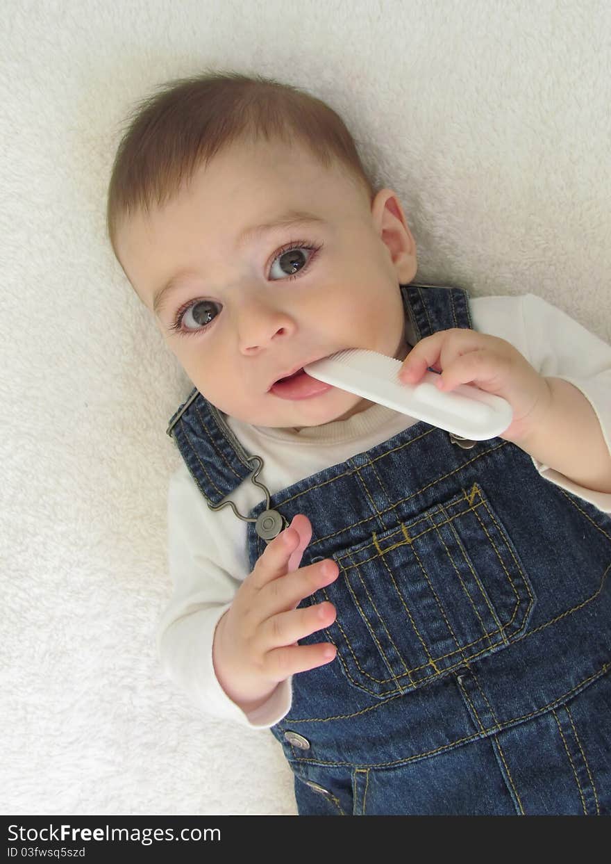 Little Boy With A White Comb