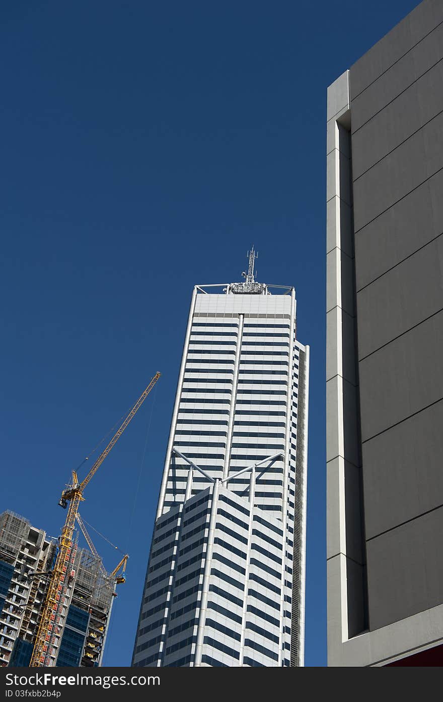 Upward View of Construction Site and Skyscraper in Perth Business District, Western Australia. Upward View of Construction Site and Skyscraper in Perth Business District, Western Australia