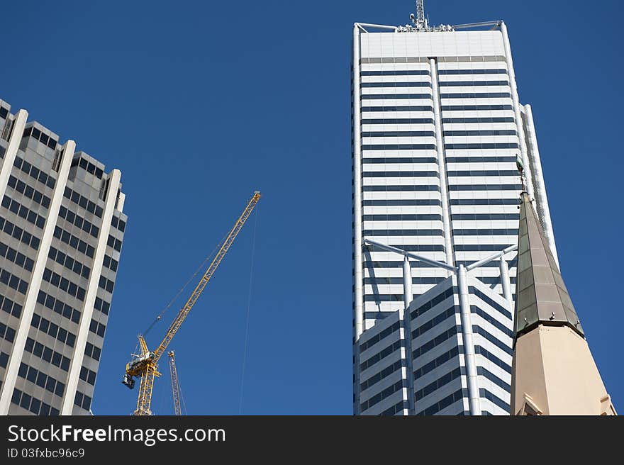 Upward View of Construction Site and Skyscraper in Perth Business District, Western Australia. Upward View of Construction Site and Skyscraper in Perth Business District, Western Australia