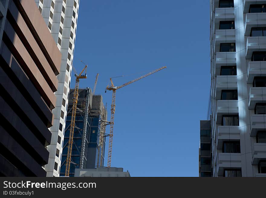 Upward View of Construction Site and Skyscraper in Perth Business District, Western Australia. Upward View of Construction Site and Skyscraper in Perth Business District, Western Australia