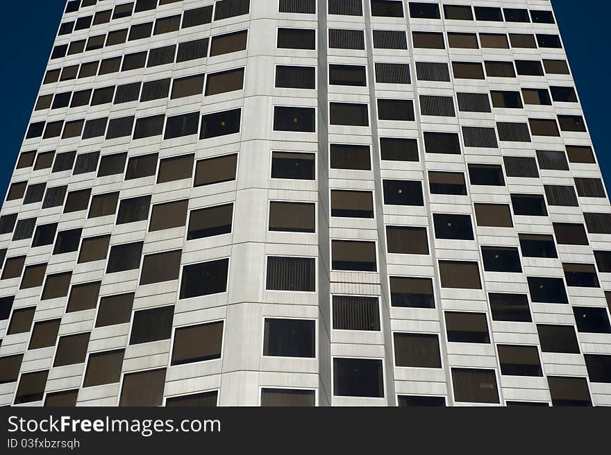 Close-Up of Skyscraper with windows as patterns on the facade. Close-Up of Skyscraper with windows as patterns on the facade.