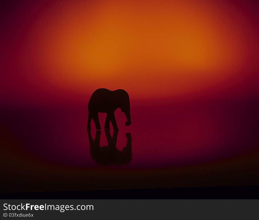 High-contrast elephant sculpture, silhouette.