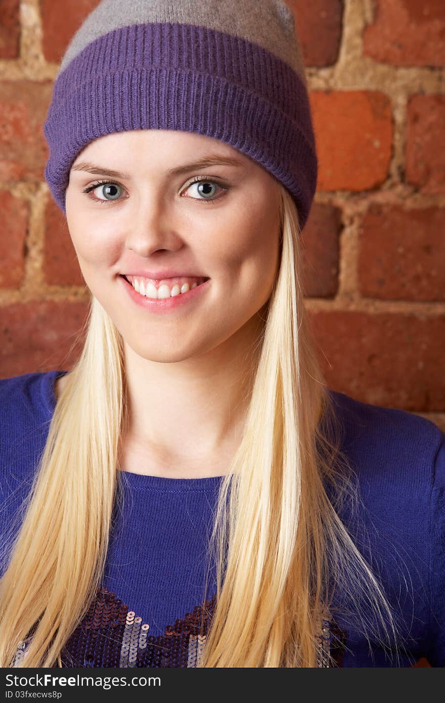 Portrait of young woman smiling at camera