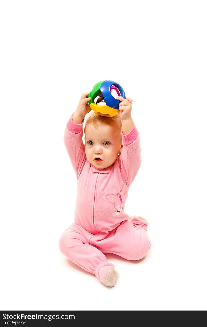 Baby girl playing with ball. Baby girl playing with ball