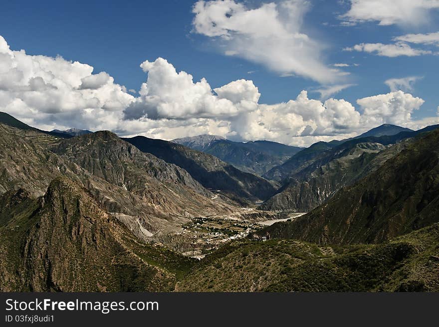 Looking down over a small village in the mountains around Shangri La, Yunnan Province, China. Looking down over a small village in the mountains around Shangri La, Yunnan Province, China.