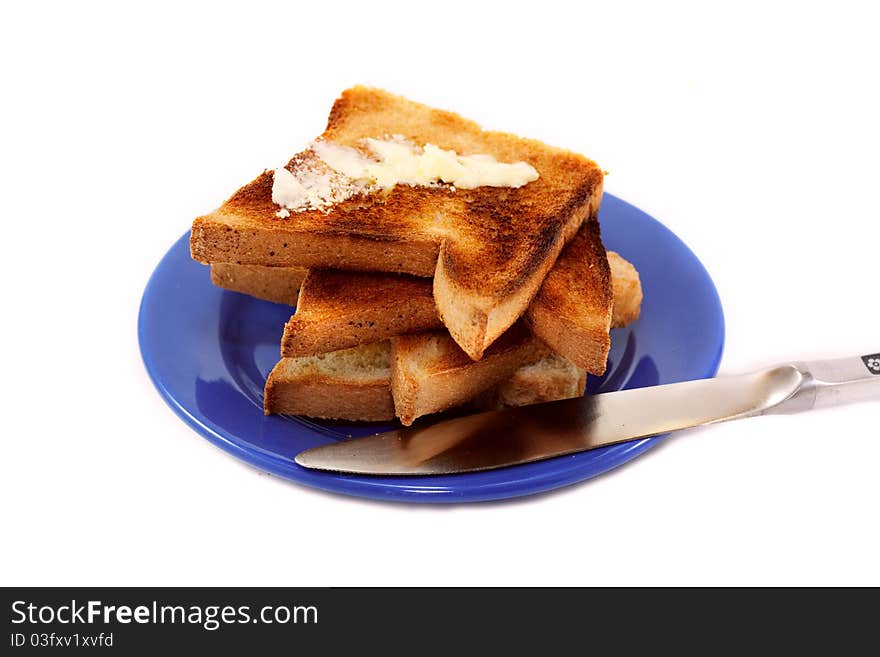 Fried bread buttered on plate isolated on white background. Fried bread buttered on plate isolated on white background