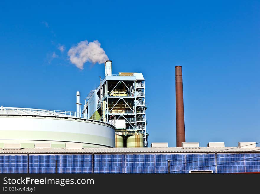 Industry park with silo and chimney with blue sky