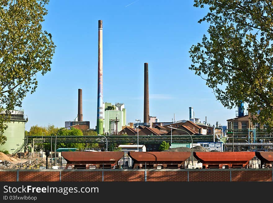 Industry park with silo and chimney with blue sky