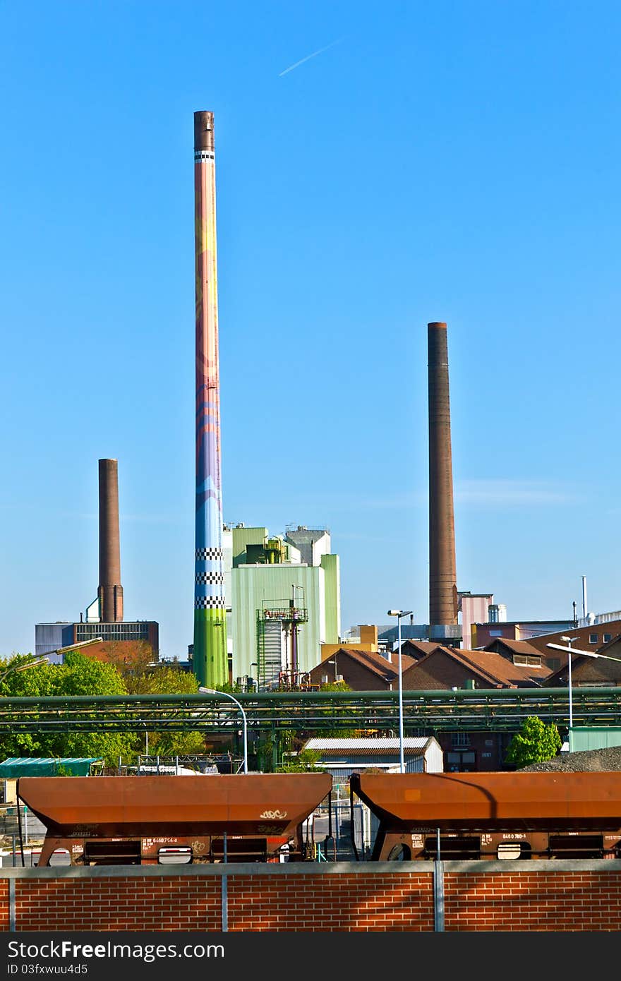 Industry park with silo and chimney and blue sky