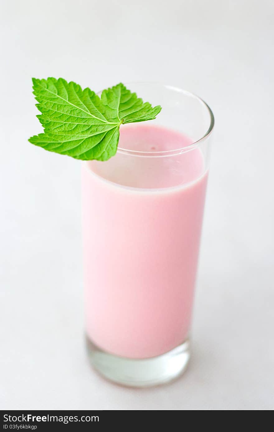 Strawberry dairy cocktail isolated on white background..