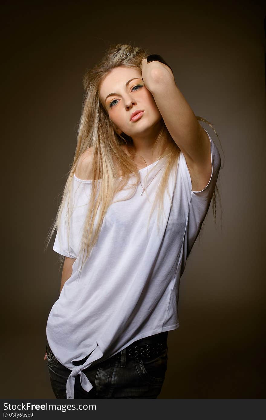 Portrait of the beauty young blond girl with make up